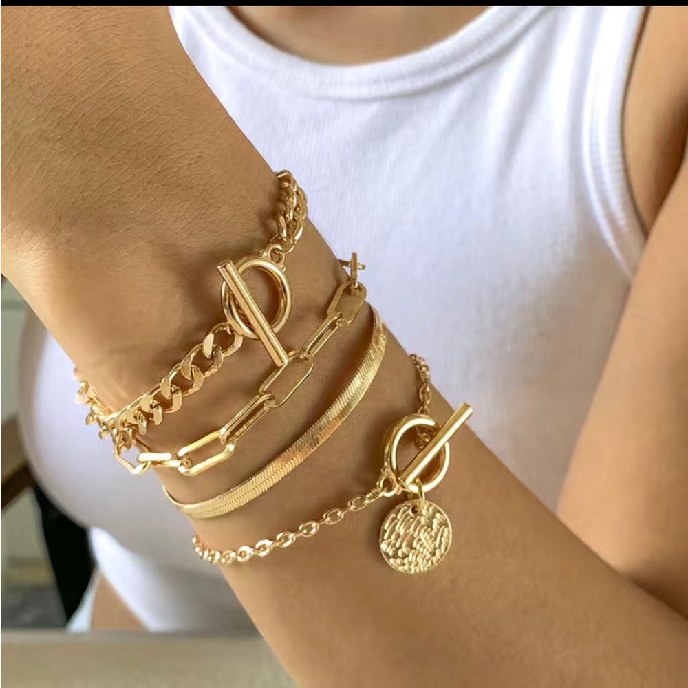 Stacked bracelet set, gold tone.